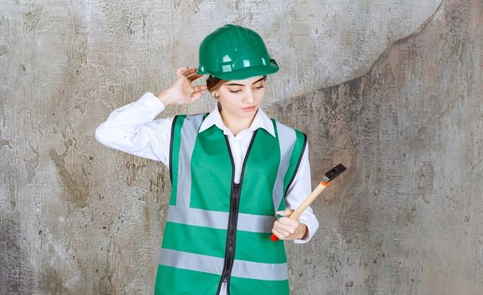 The Benefits of Custom Firefighter Radio Straps: Durable, Comfortable, and Practical photo female construction worker green helmet holding hammer 144627 72740